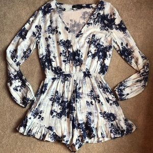 Beautiful floral long sleeve romper!